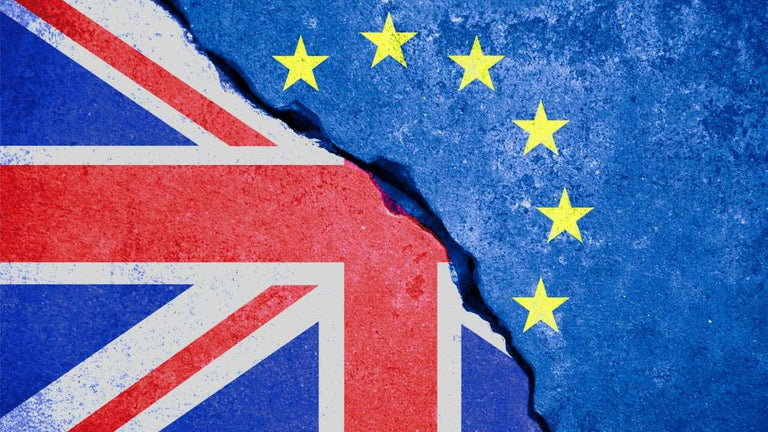 Torn Union Jack and European Union flags