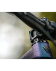 ST1 35mm Clamp - Title MTB Oil Slick Rainbow Bolts Mounted On Bike Casey Brown